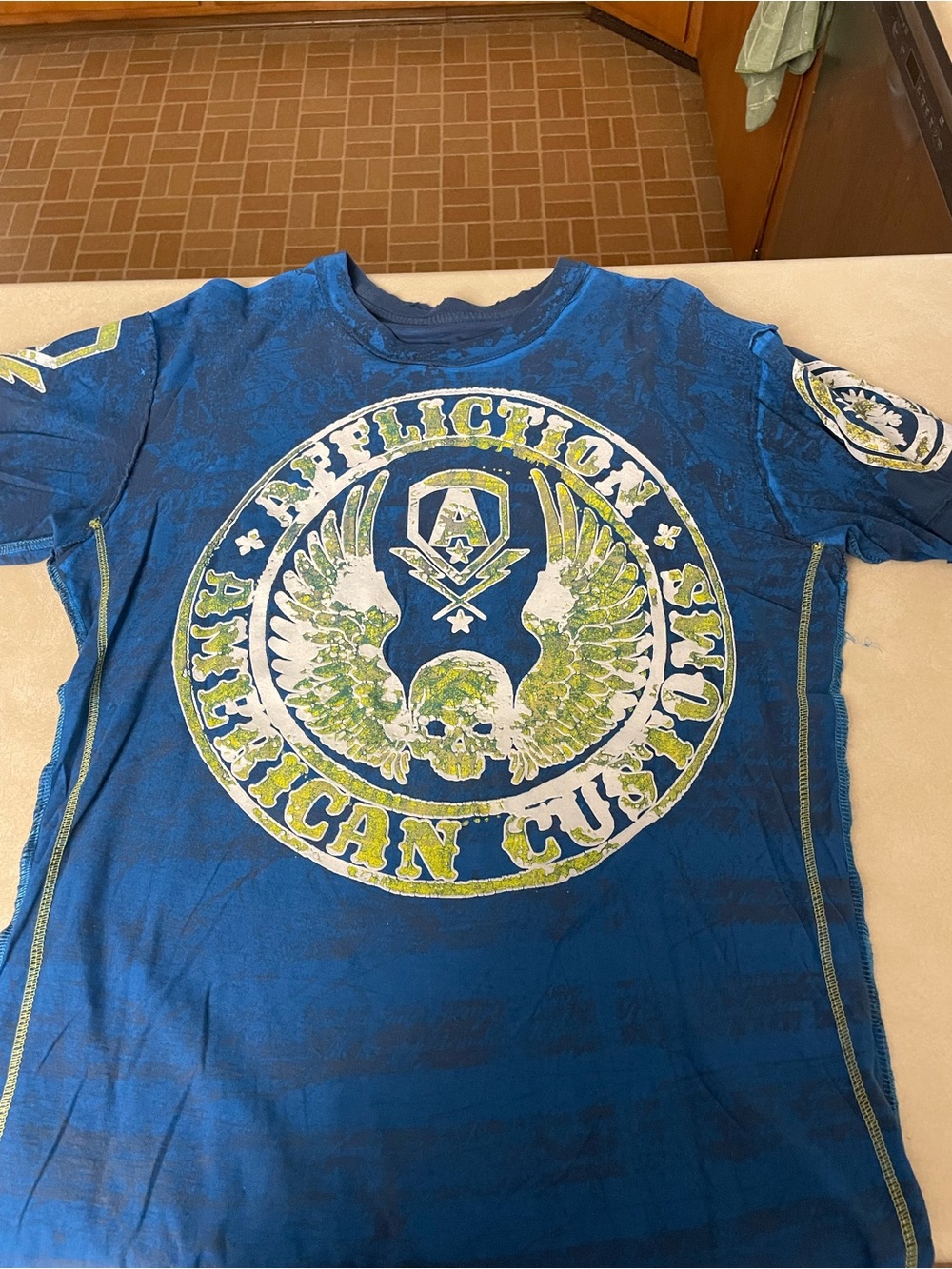 Affliction Blue Graphic Tee with White and Green Emblem